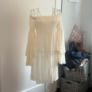 Beautiful off-white sundress with ruffles